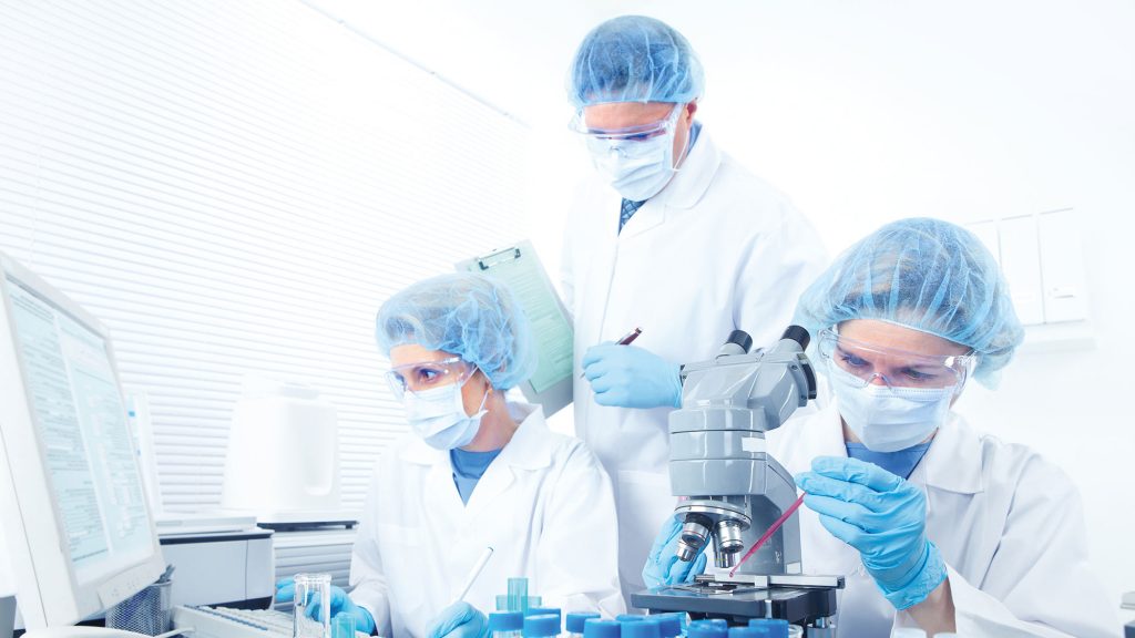 Photo of people in a forensics laboratory - Integrity Cleanroom