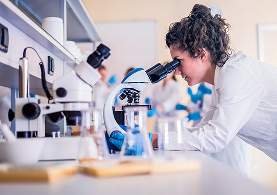 Scientists in laboratory working on research - Integrity Cleanroom