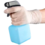 Vinyl Gloves - action shot - translucent colour, holding spray bottle